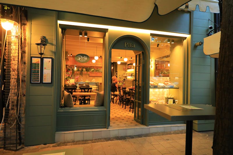 Elegant restaurant entrance with warm welcoming lighting