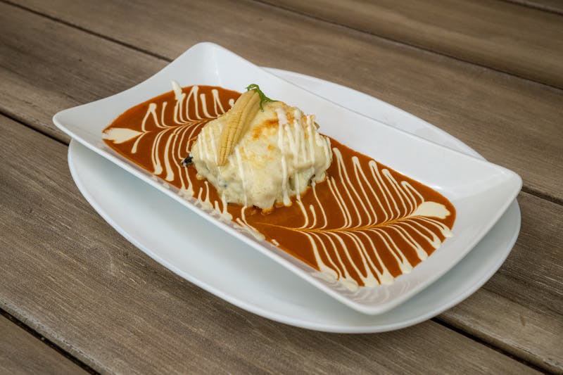 Signature burrito bowl with fresh ingredients and vibrant colors