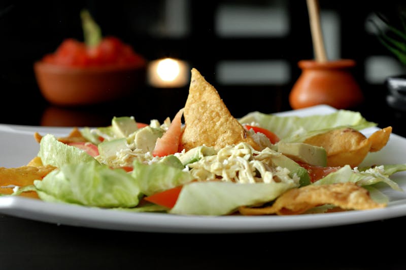 Enchiladas rojas with melted cheese and red sauce